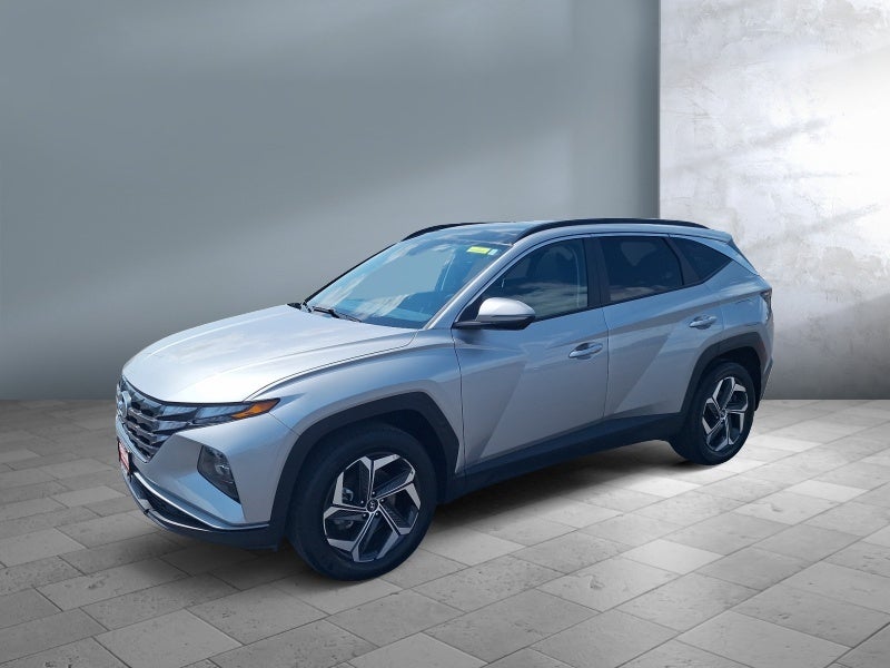 2023 Hyundai TUCSON HYBRID SEL Convenience in Shimmering Silver — front three-quarter view